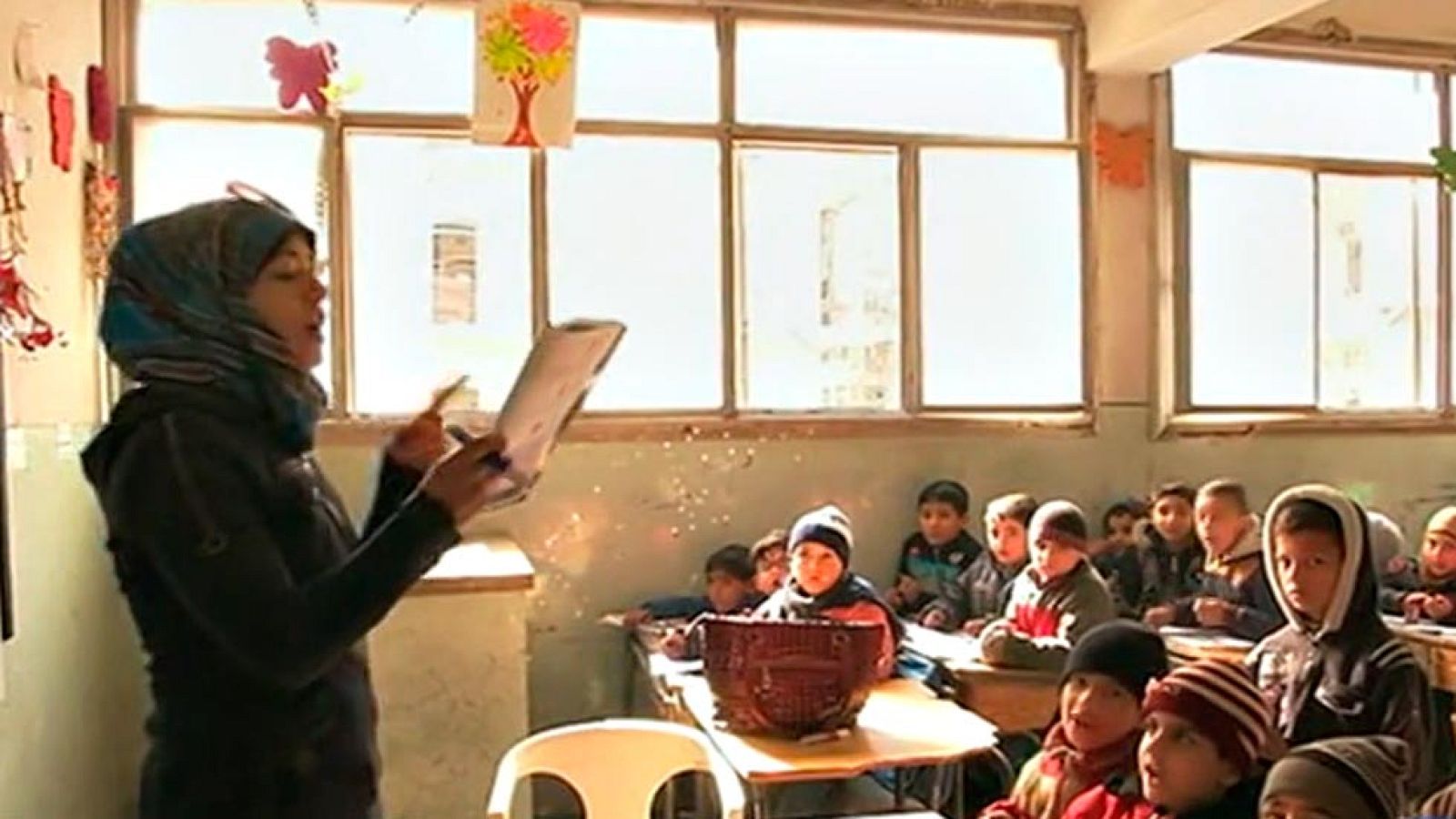 Los niños vuelven a la escuela en Alepo