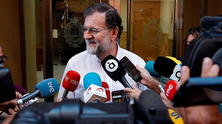 Telediario 1 - Rajoy se reincorpora a su puesto de registrador tras abandonar la política