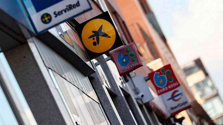 Telediario 1 - Los bancos impulsan al IBEX pese a que el Gobierno les cargará el impuesto hipotecario