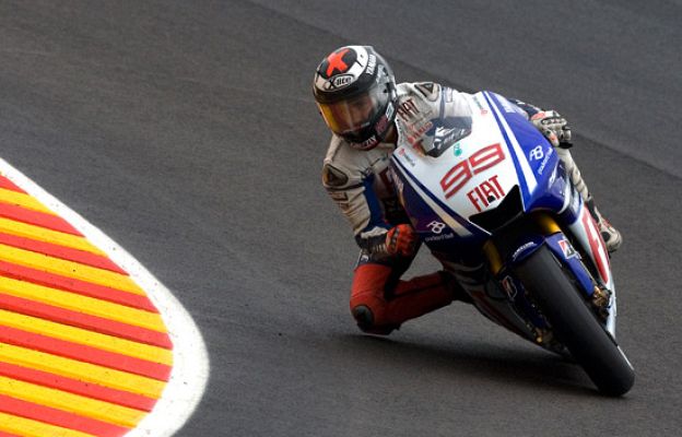  - Lorenzo, cara y Pedrosa, cruz