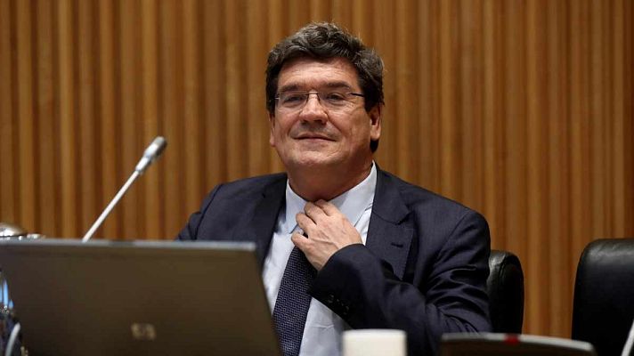 Telediario 1 - Escrivá reconoce que quedan "flecos pendientes" sobre el ingreso mínimo, que llegará en mayo