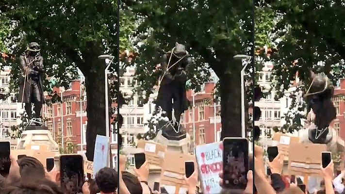 Informativo 24h - Varios manifestantes derriban en Bristol la estatua de un tratante de esclavos como protesta por la muerte de George Floyd