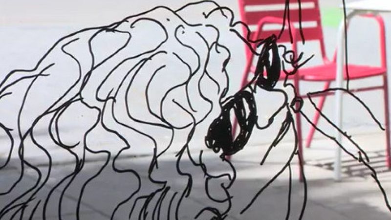 Los comercios de Lavapiés se convierten en lienzos de arte urbano | Ver