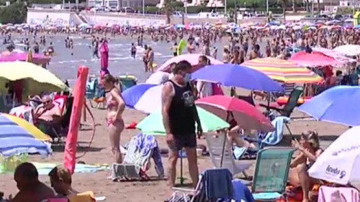 Telediario 1 - Oropesa multará con hasta 750 euros a los que cojan sitio en la playa dejando una sombrilla