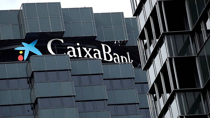 Telediario 1 - Los consejos de CaixaBank y Bankia aprueban la creación del mayor banco de España