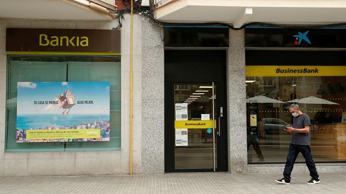 Telediario 1 - La fusión de CaixaBank y Bankia abre la puerta a la creación de gigantes bancarios a nivel europeo