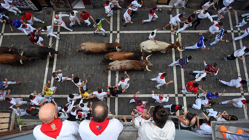 Cmo consiguen los fotgrafos capturar las mejores imgenes de los Sanfermines?