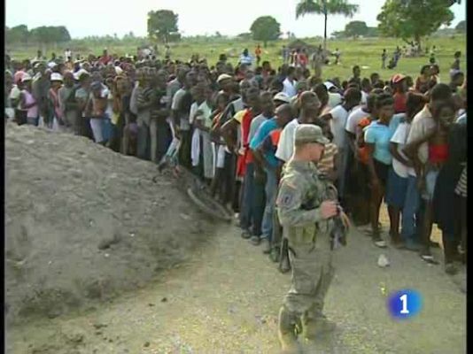  - Los marines ayudan en el reparto